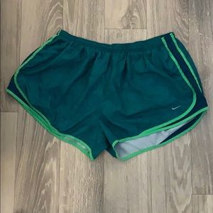 Green Nike athletic shorts